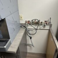 smart-plumbing-solutions-llc-00011 Exposed copper pipes and plumbing connections during installation