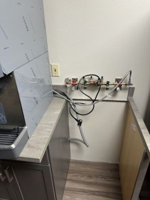 smart-plumbing-solutions-llc-00011 Exposed copper pipes and plumbing connections during installation